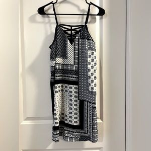 Strapless blue/white pattern mini dress with crisscross detail. Small, vestique